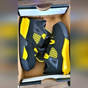 Jordan 4 Retro Black and Tour Yellow